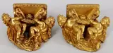 2 Wandconsoles, engelen, Twee oude barok wandconsoles met putto 20e eeuw van gegoten gips met goudverf 16x17x8cm