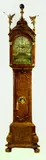 scheepjesmechaniek by Zeer fraai Amsterdams staand horloge, Eikenhout met wortelnoten opgelegd, sold Jan 2011