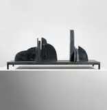 Erin Shirreff, Catalogue, 16 parts, 2013, hydrostone, pigment, graphite and steel, in 17 parts