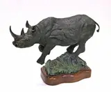 Lorenzo E. Ghiglieri, Wally's rhino, bronze with green and brown patinas on a wooden base