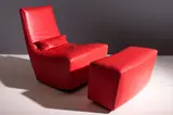 Ligne Roset, A Red Leather Easy Chair And Footstool,