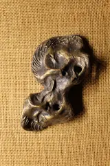 Combined Faces by Patrick McElroy, Bronze, sold Nov 2020