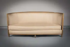 A Crescent Shaped Upholstered Sofa, by Andree Putman, sold Jun 2020