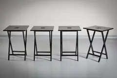 Andree Putman For Ecart, A SET OF FOUR FOLDING TABLES, by DESIGN