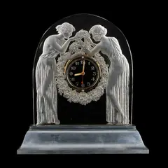 René Lalique, René Lalique (French, 1860–1945) A 'Deux Figurines' Mantel Clock, Designed 1926, glass, moulded and frosted, on illuminated metal pedestal mount