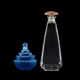 René Lalique (French, 1860–1945), An 'Ambroise' Scent Bottle by René Lalique, glass, etched and moulded R, sold Nov 2025