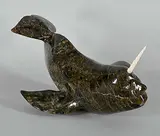Untitled - Sea Spirit by Novoalia Alariaq, black and brown stone and bone carving, sold Mar 2026
