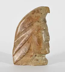 Leo W. Arcand, Untitled - Stoic Man, 2000, yellow stone carving