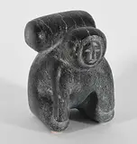 Camille Iquliq, Untitled - Man with Heavy Pack, black stone carving