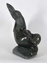 Jaco Ishulutaq, Untitled - Sedna with Graceful Tail, green stone carving