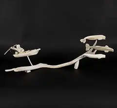Ernie Kadloo, Untitled - Hunting Beluga Whales, bone and mixed media sculpture