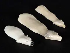 Ernie Kadloo, Untitled - Swimming Polar Bears, bone carving