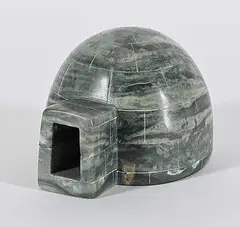 John Kuhoktak, Untitled - Igloo Interior with Man Preparing Meat, stone and mixed media carving