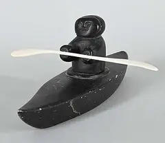 . Levi, Untitled - Lone Kayaker, black stone and bone carving