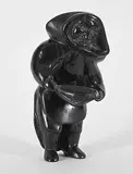 Qaunaq Mikkigak, Untitled - Woman with Pack, black stone carving