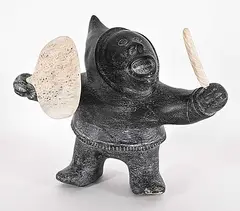 Untitled - Drum Dancer by Tommy Ashevak, black stone and bone carving, sold Sep 2025