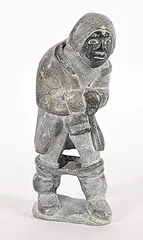 Untitled - Man with Pants Down by Henry Isluanik, grey stone carving, sold Sep 2025