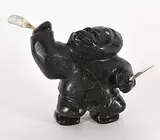 Wayne Puqiqnak, Untitled - Hunter with Club, black stone and bone carving