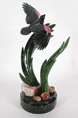 Lyle Sopel, Quick Ascent, green nephrite jade and rhodonite agate sculpture