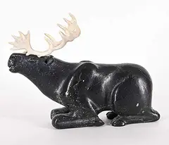 Isaac Alayco, Untitled - Resting Caribou, black stone and bone carving