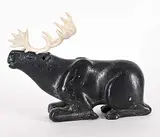 Isaac Alayco, Untitled - Resting Caribou, black stone and bone carving
