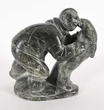 Tania Qumuluk, Untitled - Man Kissing Walrus, grey stone carving
