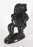 Charlie Ugyuk, Man Peeing in Pot, 1991, black stone carving