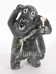 Untitled - Dancing Shaman by Judas Ullulaq, black stone carving, sold Mar 2025