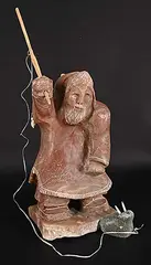 Eugeme Agluolik, Untitled - Hunter and Walrus, red/black stone and mixed media sculpture