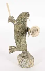 Appa Geeta, Untitled - Drumming Walrus, beige stone and bone sculpture