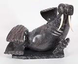 Phillip Kamikpakittuq, Dancing Walrus, purple/grey stone and bone sculpture
