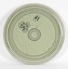 Untitled - Hanging Plate with Flower Design by Harlan House, 1973, glazed ceramic, sold Sep 2023