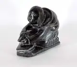 Joanassie Oomayoualook, Untitled - Skinning Seal, black stone carving