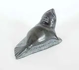 Daniel Inukpuk, Untitled - Seal Transformation, 1978, black stone carving
