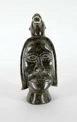 Nuveeya Ipellie, Untitled - Wearing the Bear, green stone carving with bone