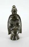 Nuveeya Ipellie, Untitled - Wearing the Bear, green stone carving with bone