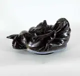 Paul Keo, Walrus and Pups, black stone carving