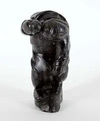 Untitled - Woman Eating by Jusi Qumaluk, black stone carving, sold Mar 2021