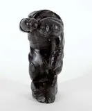 Jusi Qumaluk, Untitled - Woman Eating, black stone carving