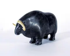 John Kohoktak, Untitled - Muskox, dark grey stone and bone carving