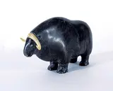 John Kohoktak, Untitled - Muskox, dark grey stone and bone carving