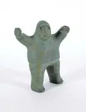 Tuna Igulik, Surprised Man, 1970, dark grey stone carving