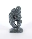 Levi Koma, Untitled - Hunter Holding His Dinner, grey stone carving
