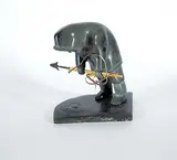 Samwillie Iqaluq, Untitled - Gone Fishing, black and grey stone carving with wood and stone spear