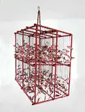 Rupert Scow, Salmon Rattle, painted wood and string hanging sculpture