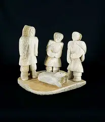 Elisapee Kuniliusee, Two Women, Man and Seal, bone carving