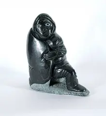 Conlucy Niviaxie, Hunter, dark grey stone carving