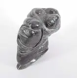 Man, Walrus and Bear by Adamie Alaku Anauta, 1976, grey stone carving, sold Mar 2015