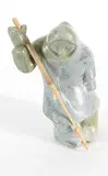 Hunter by Simeonie Tatigat Siakuluk, 1996, light green stone carving with wood, sold Mar 2015