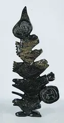 Tukiki Manomie, Collage, 2001, dark green stone carving